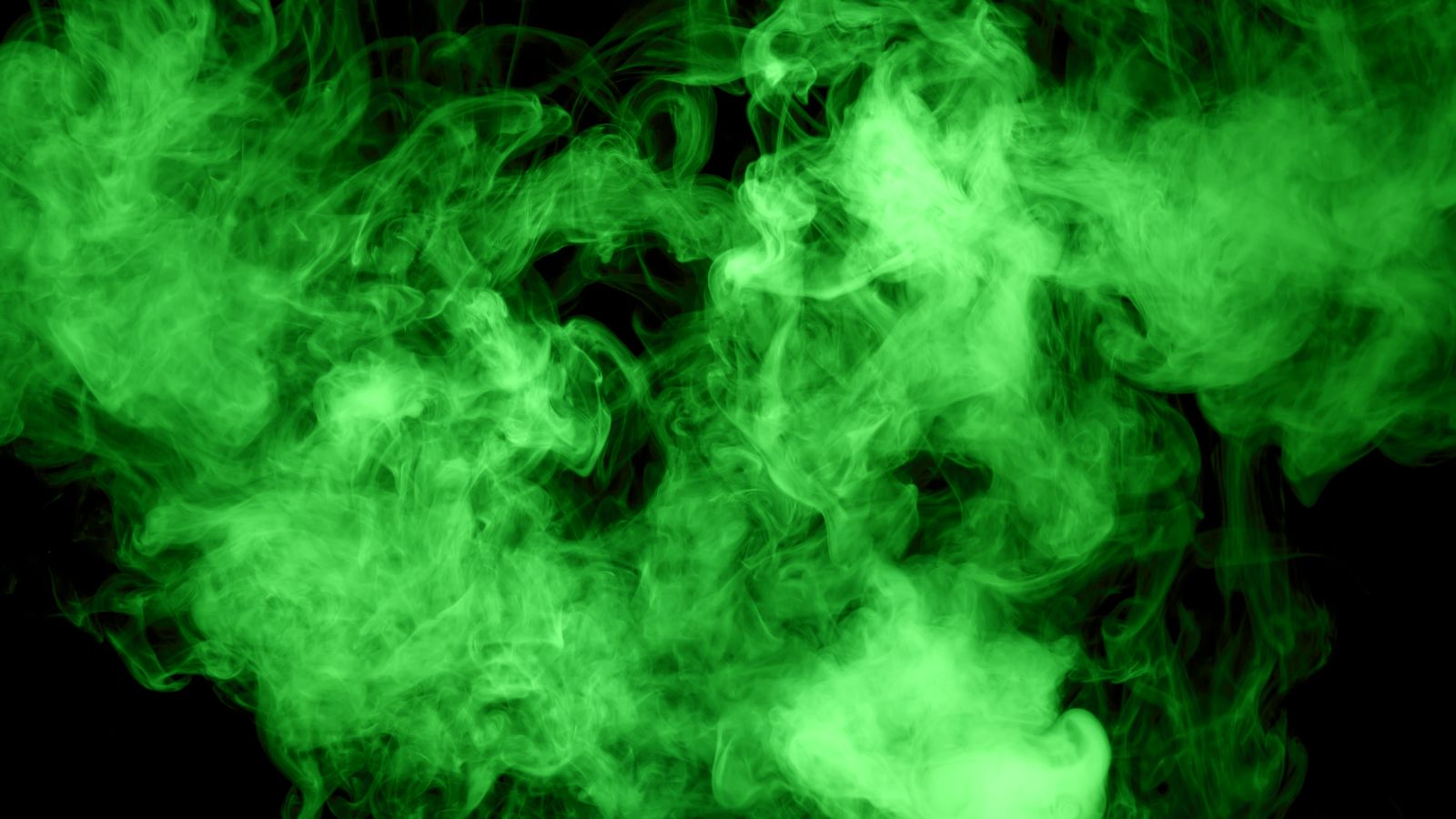 Das Bild zeigt eine grüne Dampfwolke vor schwarzem Hintergrund.