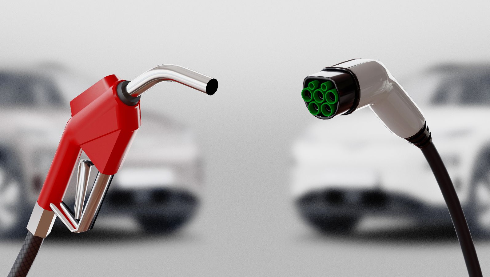 The image shows two fuel pumps — one for conventional fuels such as petrol or diesel, and one for electricity — symbolising the concept of hybrid technology.