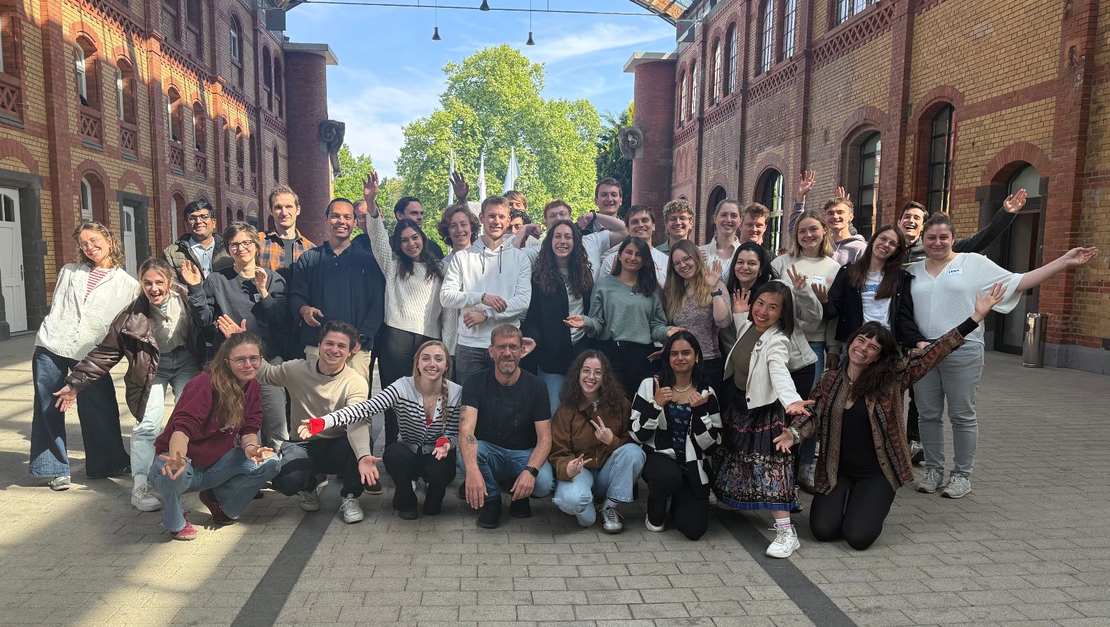 The picture shows several young people standing in a group forming the participants of P2X Summer Lab